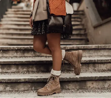 How to Dress Up with Timberland Boot - pair them with a dress or skirt